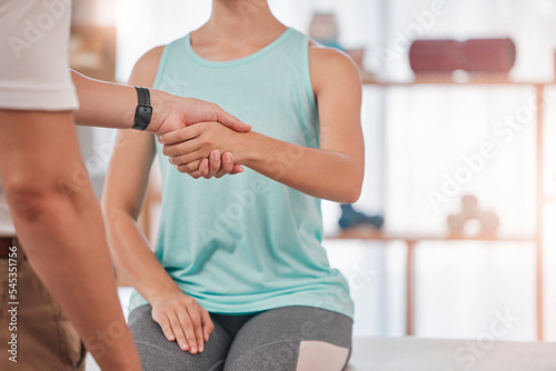 Physiotherapy, hand shake and woman consulting physiotherapist for spinal, back and problem at a clinic with trust, support and help. Chiropractor, shaking hands and girl client with back pain issue