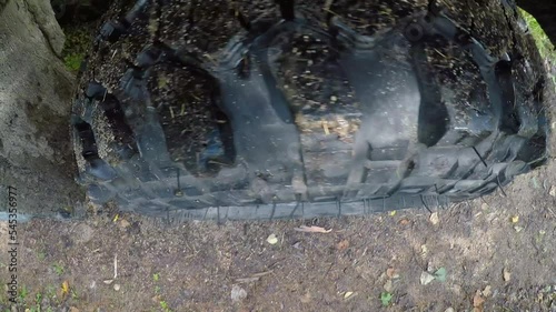 The car overcomes a difficult road. Swamps, rivers, mud, forest road