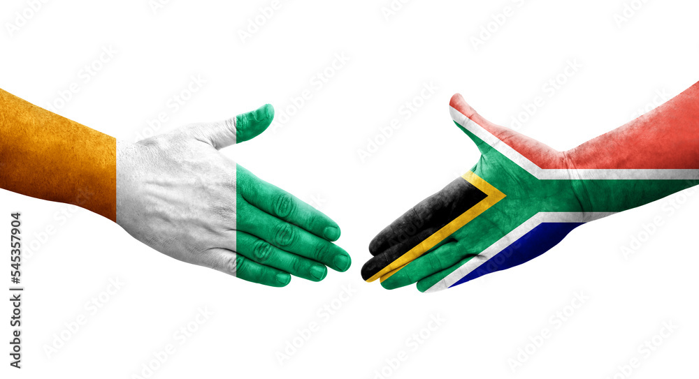 Handshake between South Africa and Ivory Coast flags painted on hands, isolated transparent image. Handshake between South Africa and Ivory Coast flags painted on hands, isolated transparent image.