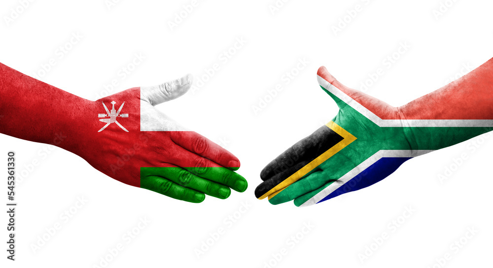 Handshake between South Africa and Oman flags painted on hands, isolated transparent image. Handshake between South Africa and Oman flags painted on hands, isolated transparent image.