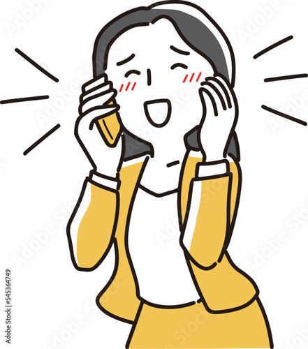 笑顔で電話する女性
