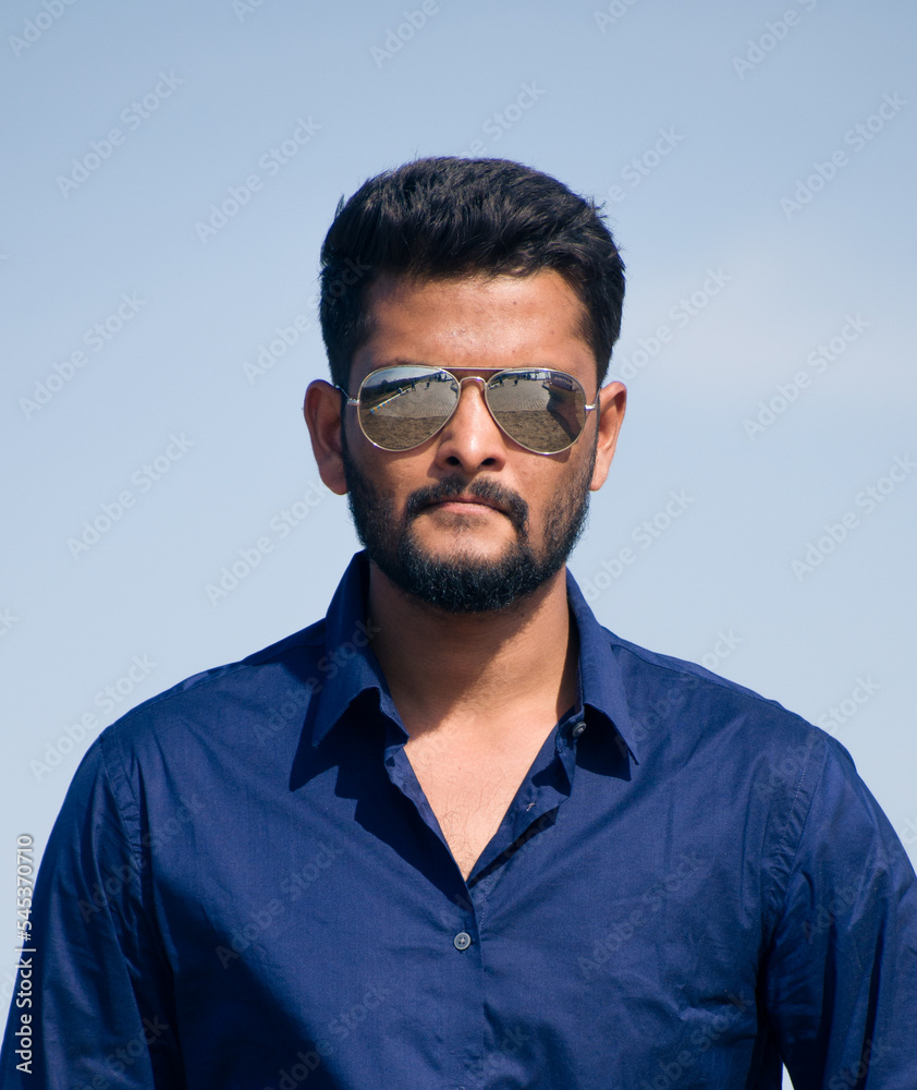 Handsome Indian guy with sunglasses. Handsome Indian guy with sunglasses.