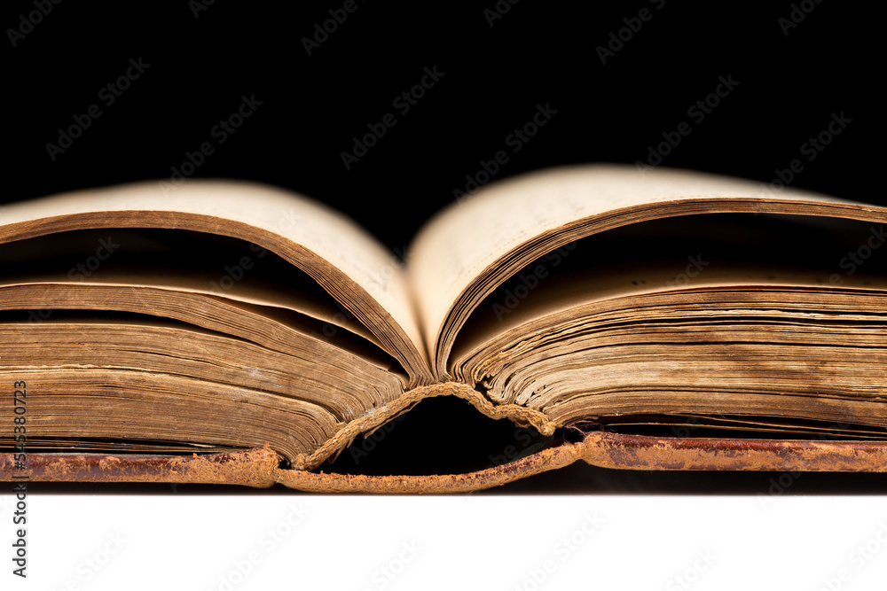Fototapeta premium ancient book shot on black background