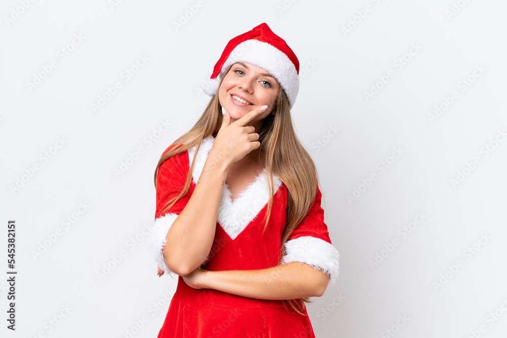 Young caucasian woman dressed as mama noel isolated on white background smiling Young caucasian woman dressed as mama noel isolated on white background smiling