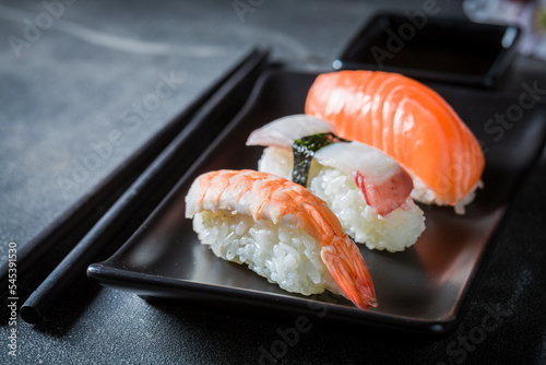 Fresh and colorful Nigiri sushi made of rice and salmon.