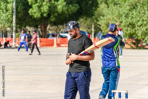 Photography local people playing cricket