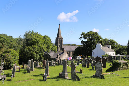A view of the large multi denominational cemetery set on a pretty hillside in Sulby, Isle of Man. photo