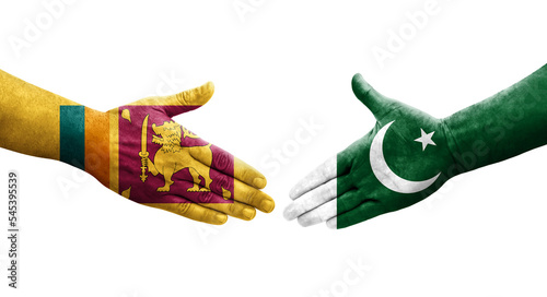 Handshake between Sri Lanka and Pakistan flags painted on hands  isolated transparent image.