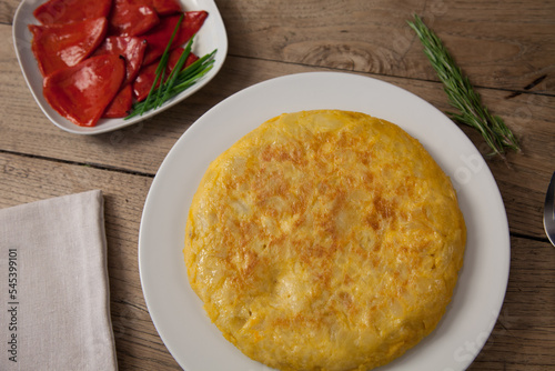 Tortilla de patatas, tortilla española, pimientos del piquillo photo