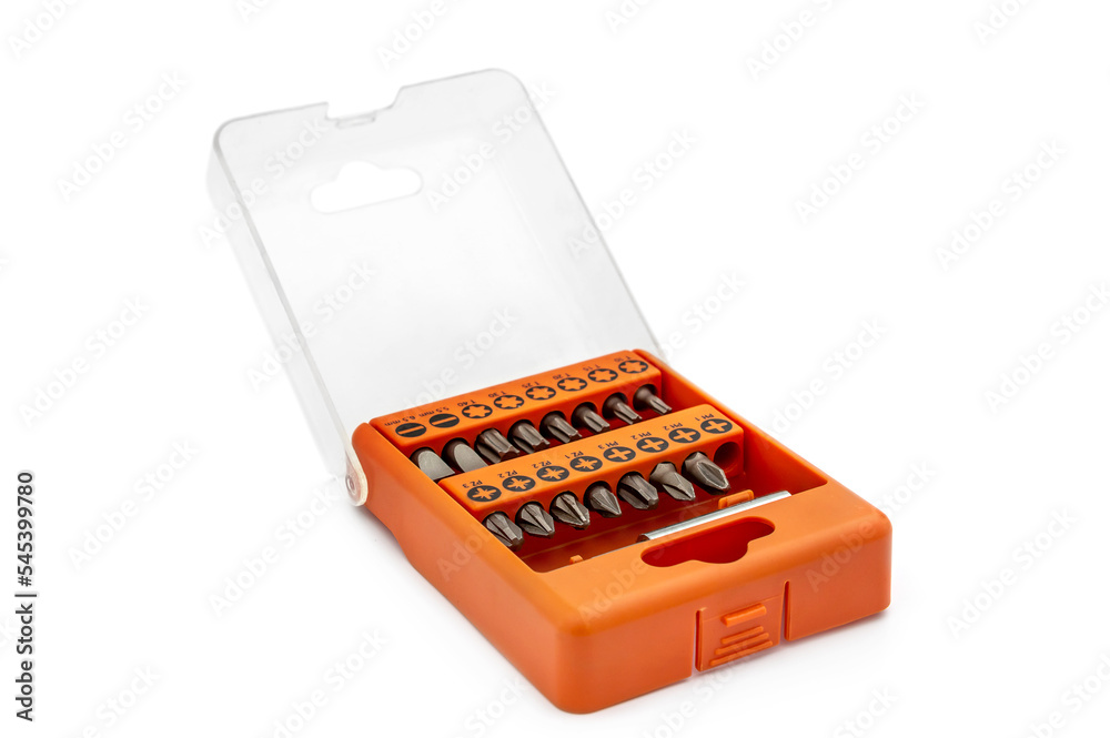 Set of bits for screwdriver in box. Isolated on white. Set of bits for screwdriver in box. Isolated on white.