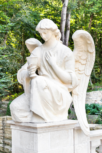 Statue of angel in Zarvanytsia spiritual center at Ternopil region. photo