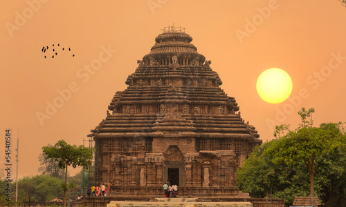 Konark Sun Temple at sunrise - An acient temple built  built in the 13th century at Puri Odisha, India designated as a UNESCO World Heritage site. photo