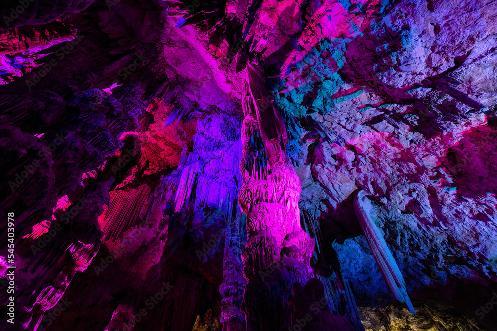 Saint Michael's Cave with colorful lights. Natural Rock Formation. Gibraltar, UK. Nature Background.