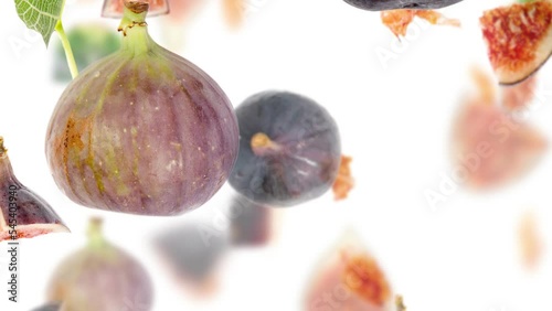 Fig fruit pieces, slices and leaves being moved isolated on white. Seamless looping. High quality 4k video.