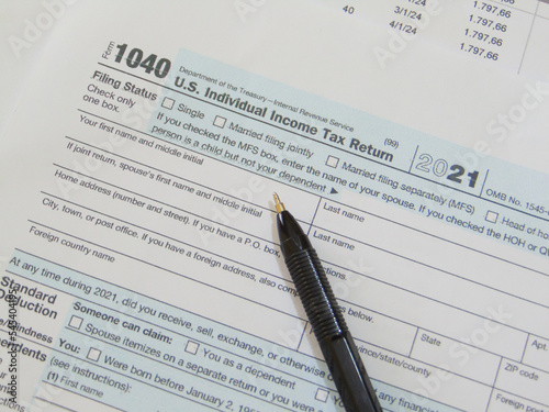 tax form with pen