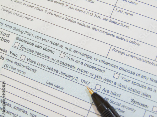 tax form with pen