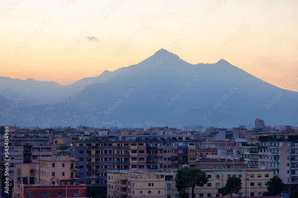 Old Apartment Buildings in Urban Downtown City with Mountains in Background. Palermo, Sicily, Italy. Dramatic Sunset Sky