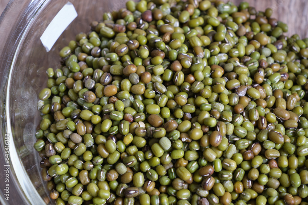 Close up view of a lot of mung beans in a bowl Close up view of a lot of mung beans in a bowl