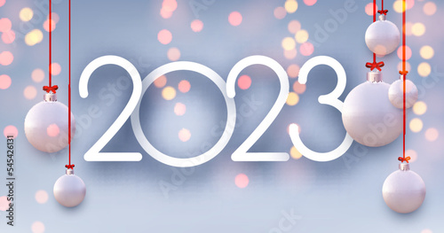 2023 sign in with white hanging baubles on blue background with bokeh.