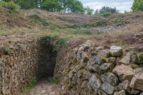The megalithic site Mané-er-Hroëk ('Mountain of the Woman') is one of the great tumuli in the Carnac area, Locmariaquer, Département Morbihan Brittany, France photo