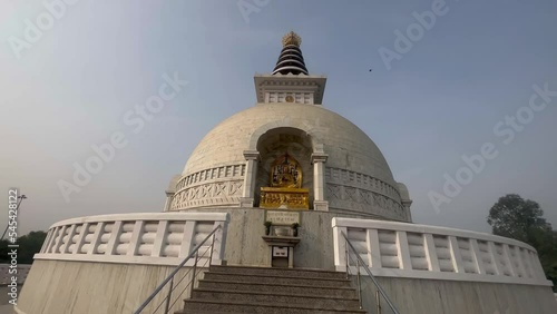 Delhi, India- 26 Sep ‎2022 : View of the Vishwa Shanti Stupa, known as World Peace Pagoda. Indraprastha Park in New Delhi. photo