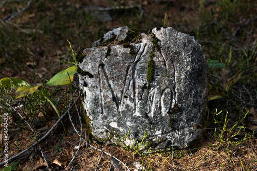 An Old Stone with M10 Script on it probably a Military Mark from the Great War photo