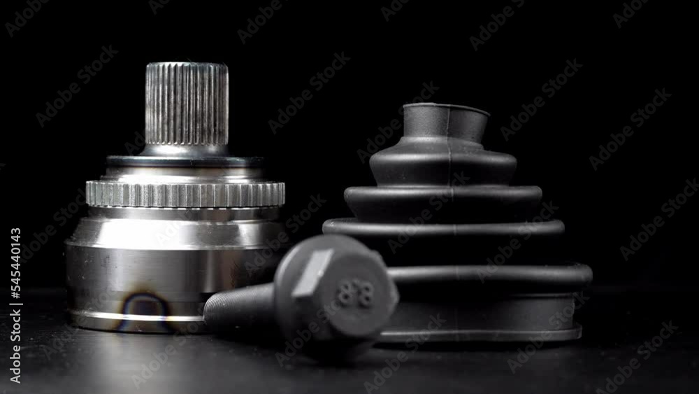 Car CV joint. Drive shaft connection on black background. New constant velocity joints. New automotive CV joints. Quality spare parts for car service or maintenance. Auto parts store. kit with anther Car CV joint. Drive shaft connection on black background. New constant velocity joints. New automotive CV joints. Quality spare parts for car service or maintenance. Auto parts store. kit with anther