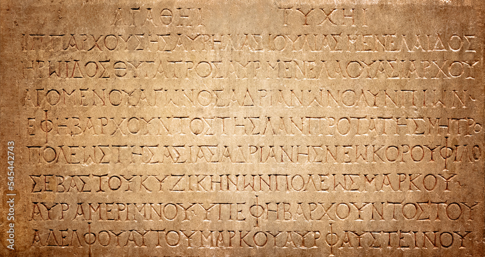 Ancient Greek text. Ancient Greek is the language of the empire of Alexander and the kingdom of the Diadochi, the Roman Empire. Background on the theme of ancient culture, archeology and history. - obrazy, fototapety, plakaty 