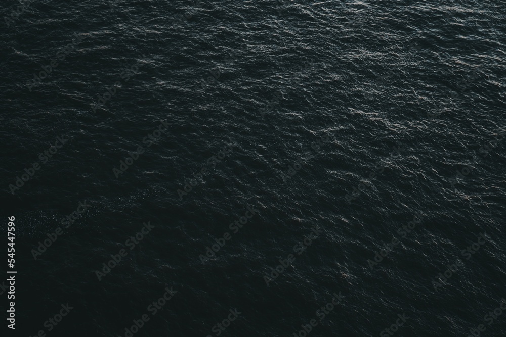 Top view of the water surface of the sea in the dark Top view of the water surface of the sea in the dark
