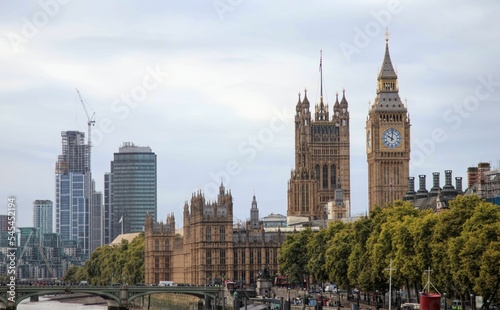 Scenic shot of the London skyline with Buckingham Palace Big Ben and a waterscape