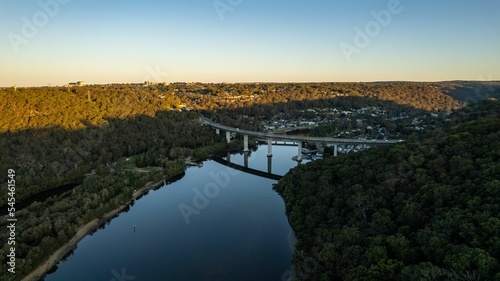 Photography Woronora River surrounded by lush greenery and Woronora Bridge in Sutherland sub