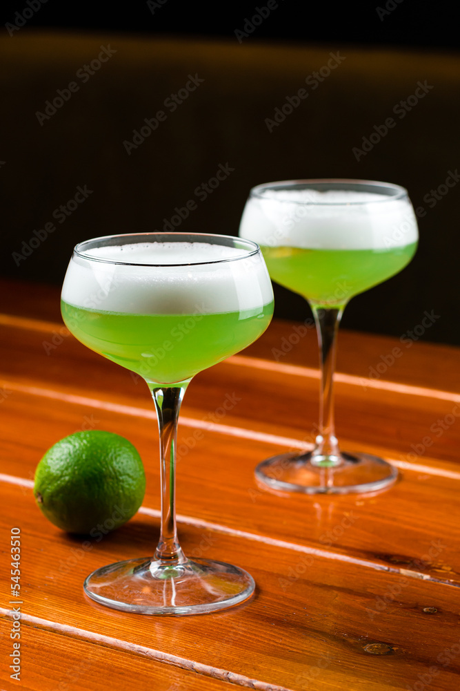 Green cocktail with vermouth, mint and citrus Green cocktail with vermouth, mint and citrus