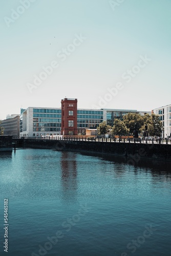Vertical of a Berlin cityscape along a river