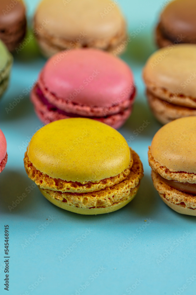 Close-up of macarons cakes of different colors .Culinary and cooking concept. Tasty colorful macaroons.