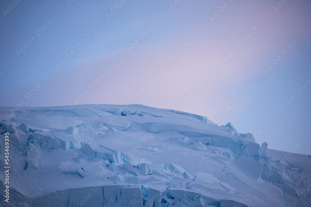 Morning light over a mountain on Gerlache Strait