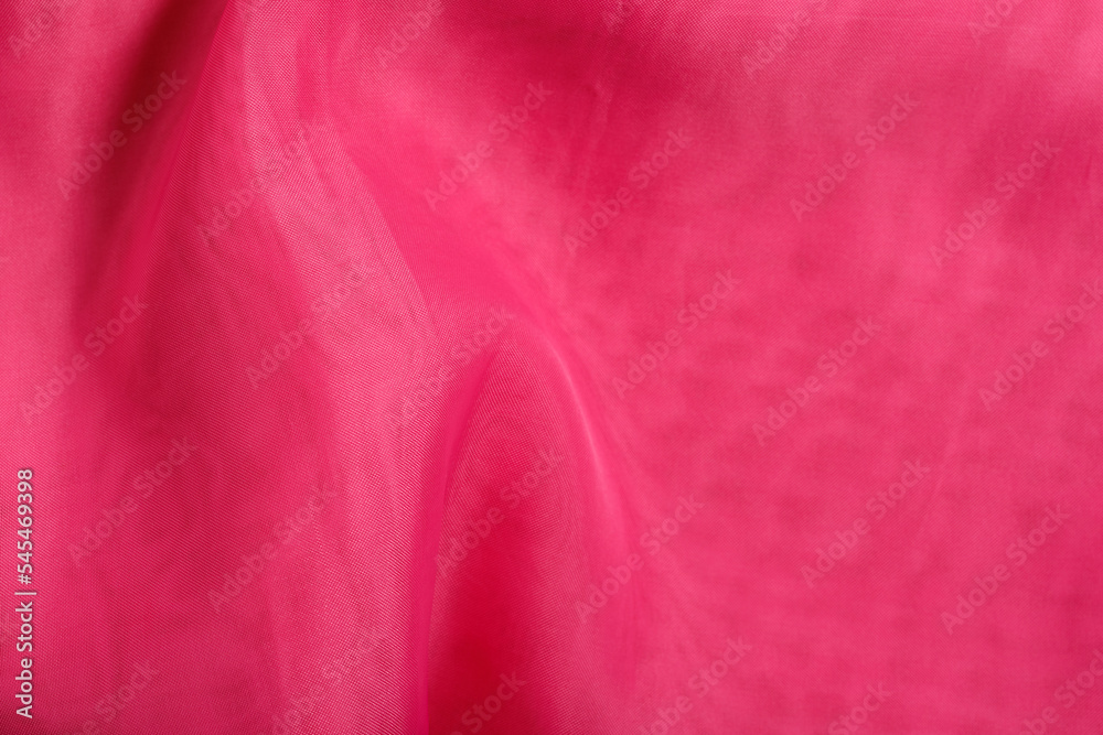 Fototapeta premium red silk fabric. wavy fabric texture