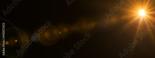 Photography Optical Flare with shiny warm rays and Camera lens effect. Light Overlay isolated on Black background 