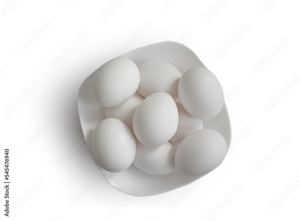 Whole eggs in a plate isolated on white background