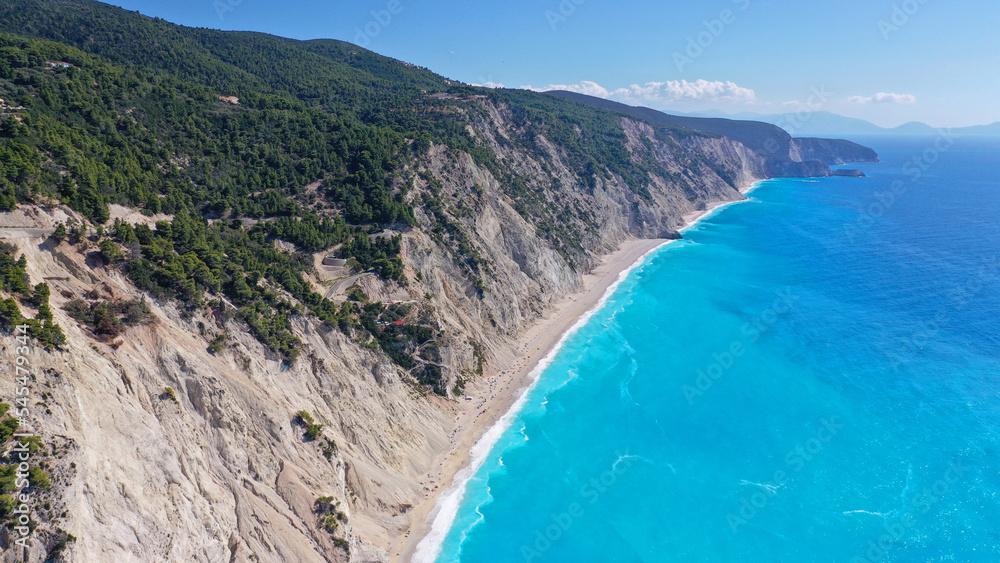 Aerial drone photo of famous paradise beach of Egremni white steep rocky hills overlooking deep turquoise Ionian sea, Lefkada island Aerial drone photo of famous paradise beach of Egremni white steep rocky hills overlooking deep turquoise Ionian sea, Lefkada island