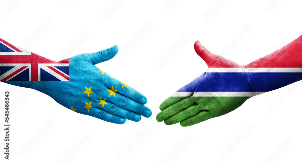Handshake between Tuvalu and Gambia flags painted on hands, isolated transparent image.