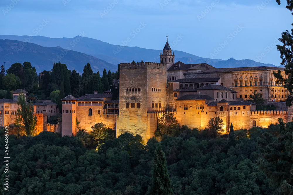 Night view of Alhambra de Granada. It is one of the best-preserved palaces of the historic Islamic world, in addition to containing notable examples of Spanish Renaissance architecture.