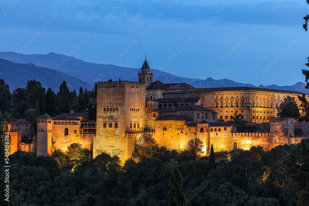 Night view of Alhambra de Granada. It is one of the best-preserved palaces of the historic Islamic world, in addition to containing notable examples of Spanish Renaissance architecture.
