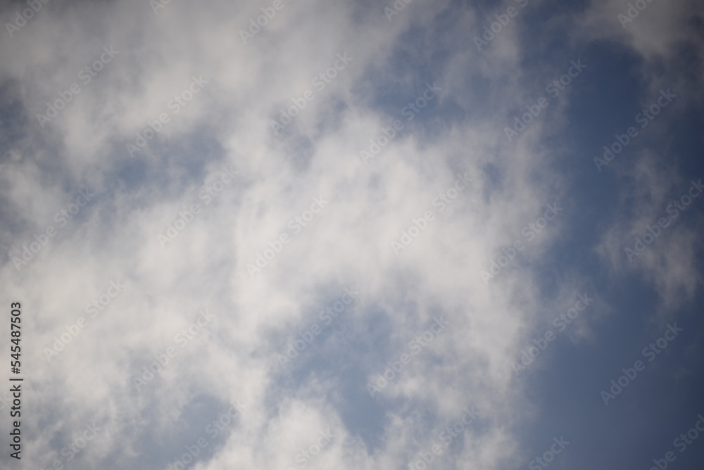 white cirrus clouds against the blue sky, white clouds against the blue sky before the rain in Ukraine