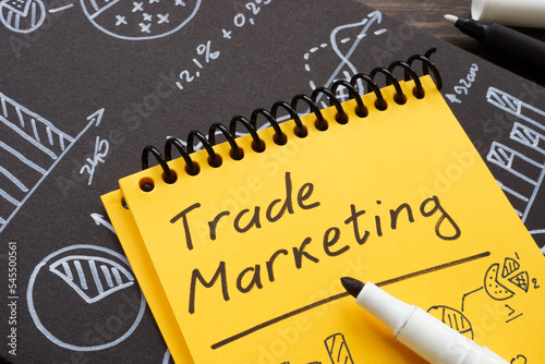 Marks with charts about trade marketing on the page.