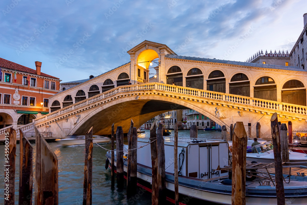 Rialto bridge over Grand canal at sunrise, Venice, Italy