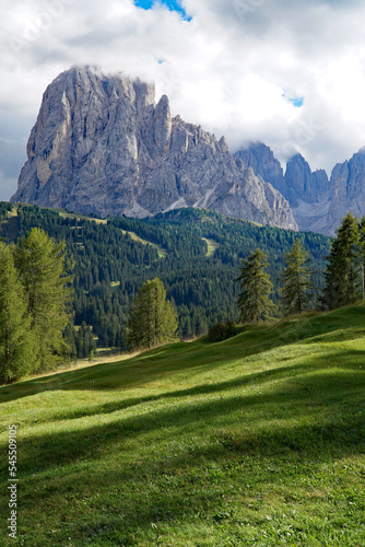 Majestic mountain view in the dolomites: Distinctive Sassolungo mountain group at gardena valley in south tyrol.  © grahof_photo