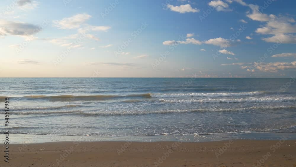 sea beach in the morning video with copy space, waves of the sea that bathe the shore of sand footage sea beach in the morning video with copy space, waves of the sea that bathe the shore of sand footage