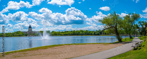 Wascana Park panoramic landscape with lake, fountain and walking path in Regina Saskatchewan Canada