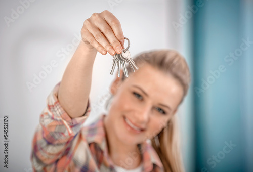 Happy Woman with Keys to a New Flat
