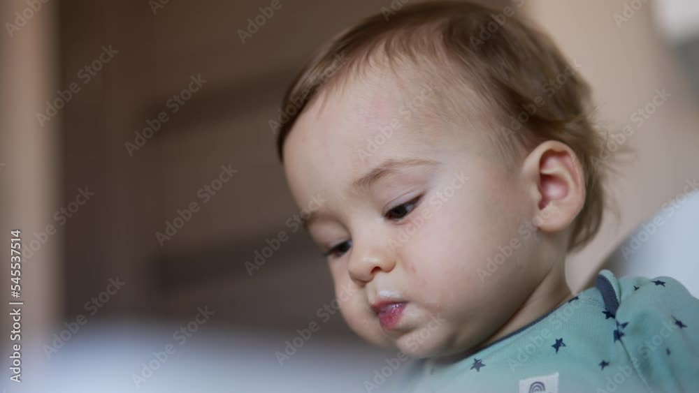 Happy child having breakfast. Portrait of little cute boy eating. Happy child having breakfast. Portrait of little cute boy eating.